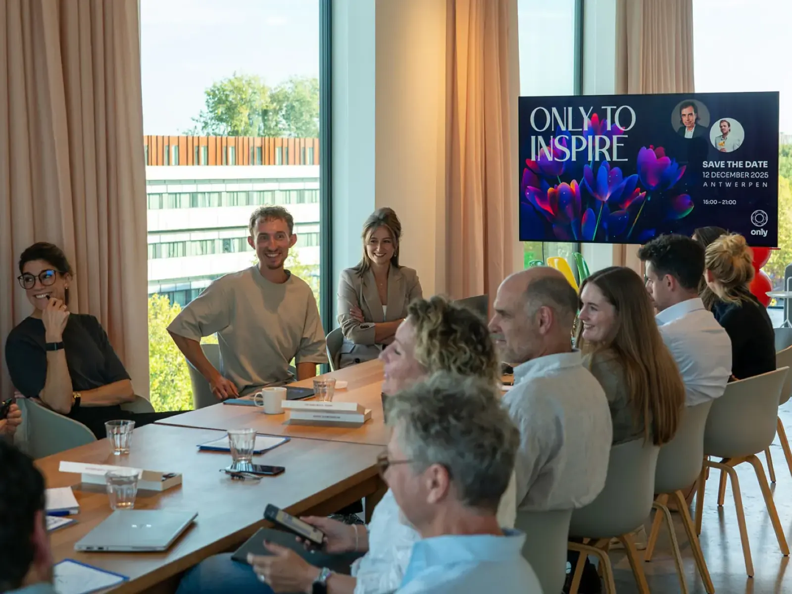 Only colleagues sharing ideas around a table